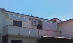 Due tende ad attico grigie su misura per terrazzo RIF: TS298