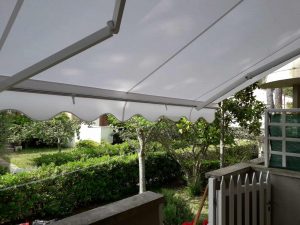 tenda a bracci con mantovana ondulata
